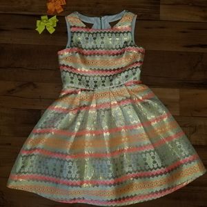 Gold, orange, dark orange, yellow and cream dress